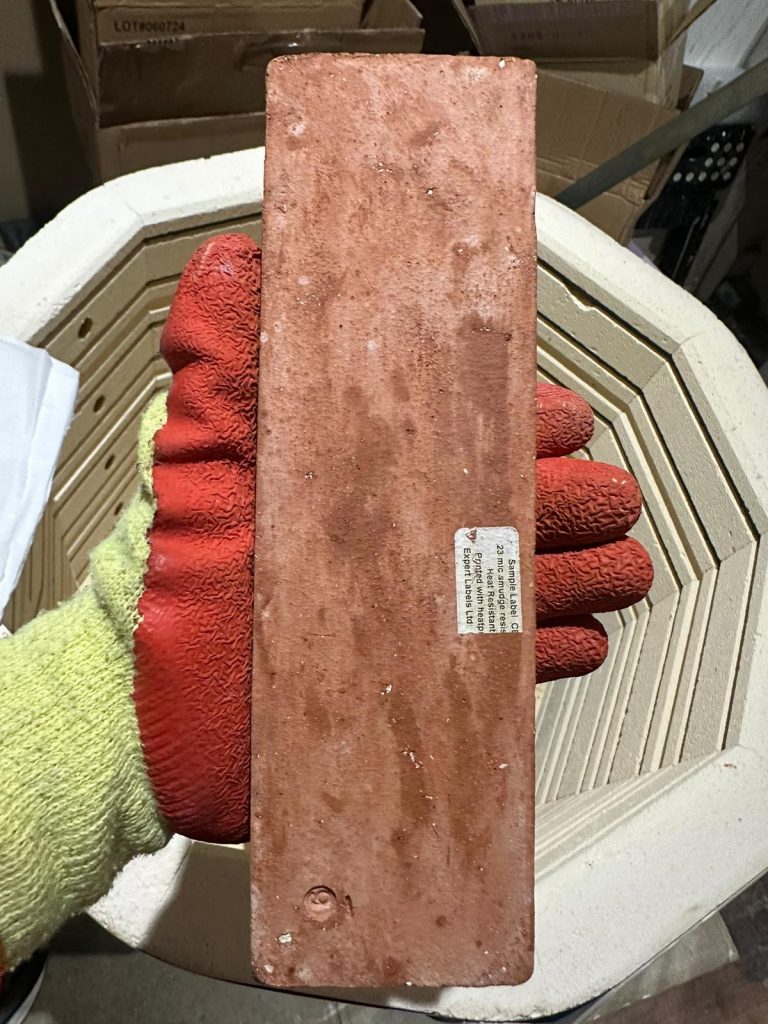 Ultra High Temp Labels on a brick after the kiln